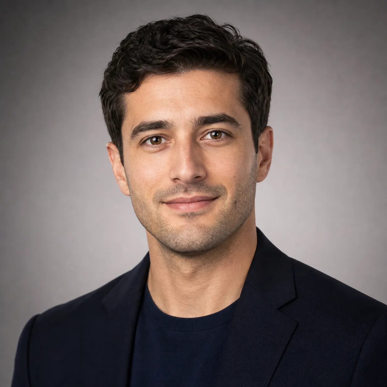 Identity-locked AI professional headshot of the same 30-something man with a consistent jawline, eye spacing, and hairline, the fixed version after applying the front-loaded identity anchor prompt.