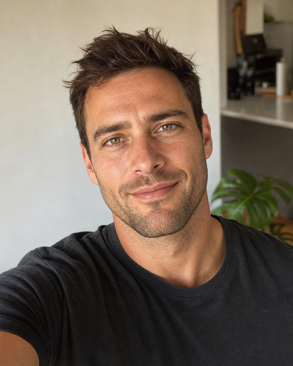 A photoreal 4:5 vertical dating-app lead photo of a 32-year-old man with brown hair and hazel eyes holding his phone at eye level for a real-iPhone-selfie composition in soft natural window light, his face occupying about 65% of the vertical frame and his eyes landing on the upper-third grid line, the close-crop end of the recommended range.