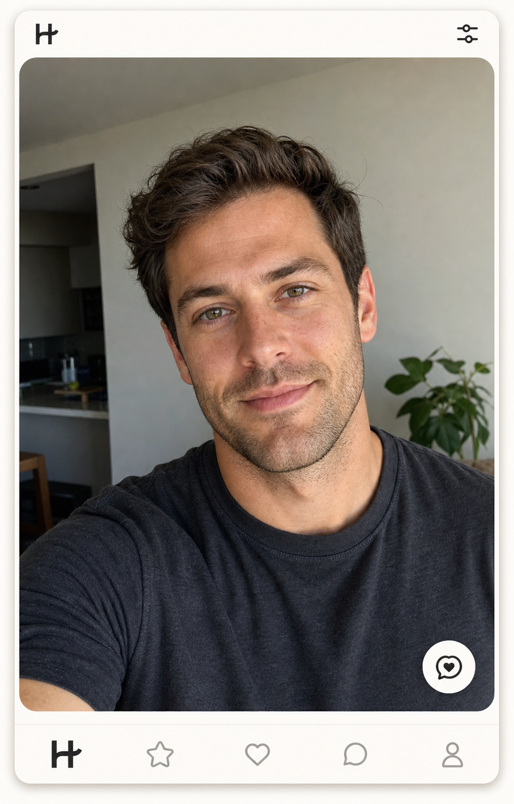 Hinge lead-photo example: a 4:5 portrait close-up of a man in his early thirties with brown hair, hazel eyes, square jaw, and light stubble inside a Hinge profile card, soft natural window light, warm half-smile with direct eye contact, plain charcoal cotton tee, identity-locked to demonstrate the Hinge lead-photo move in 2026.