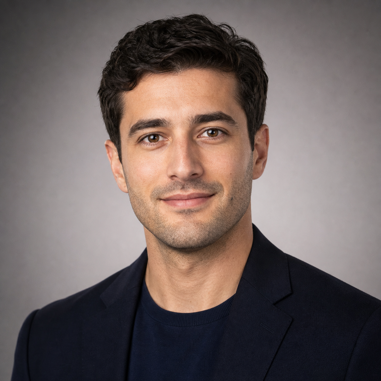 Identity-locked AI professional headshot of the same 30-something man with a consistent jawline, eye spacing, and hairline, the fixed version after applying the front-loaded identity anchor prompt.